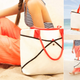 Illustration for article titled This Smart Beach Bag Keeps the Sand Out of Your Stuff